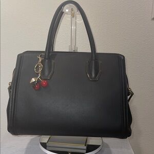 MCM Black Satchel with Red Cherry Charm